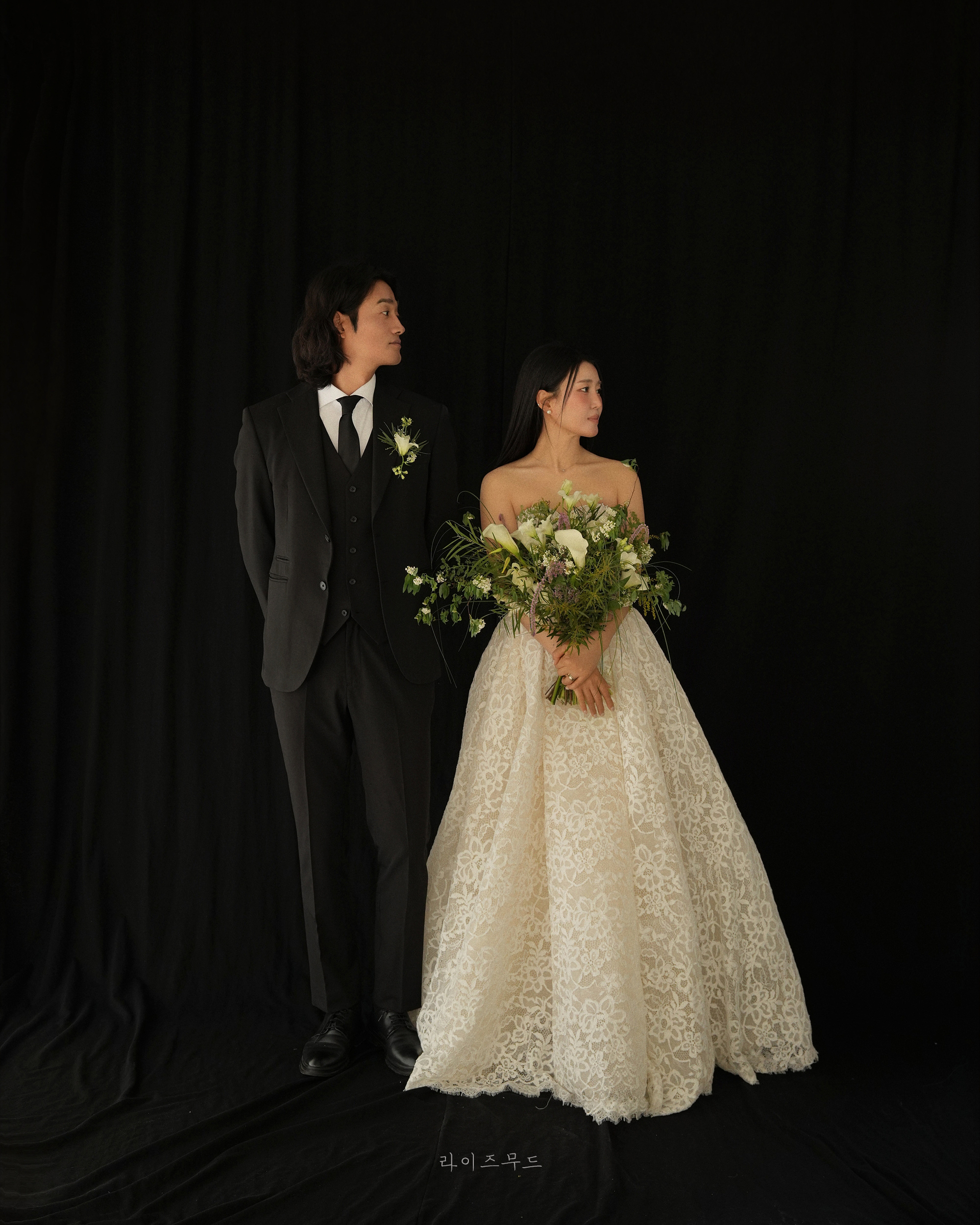 Bride and groom in an editorial studio portrait