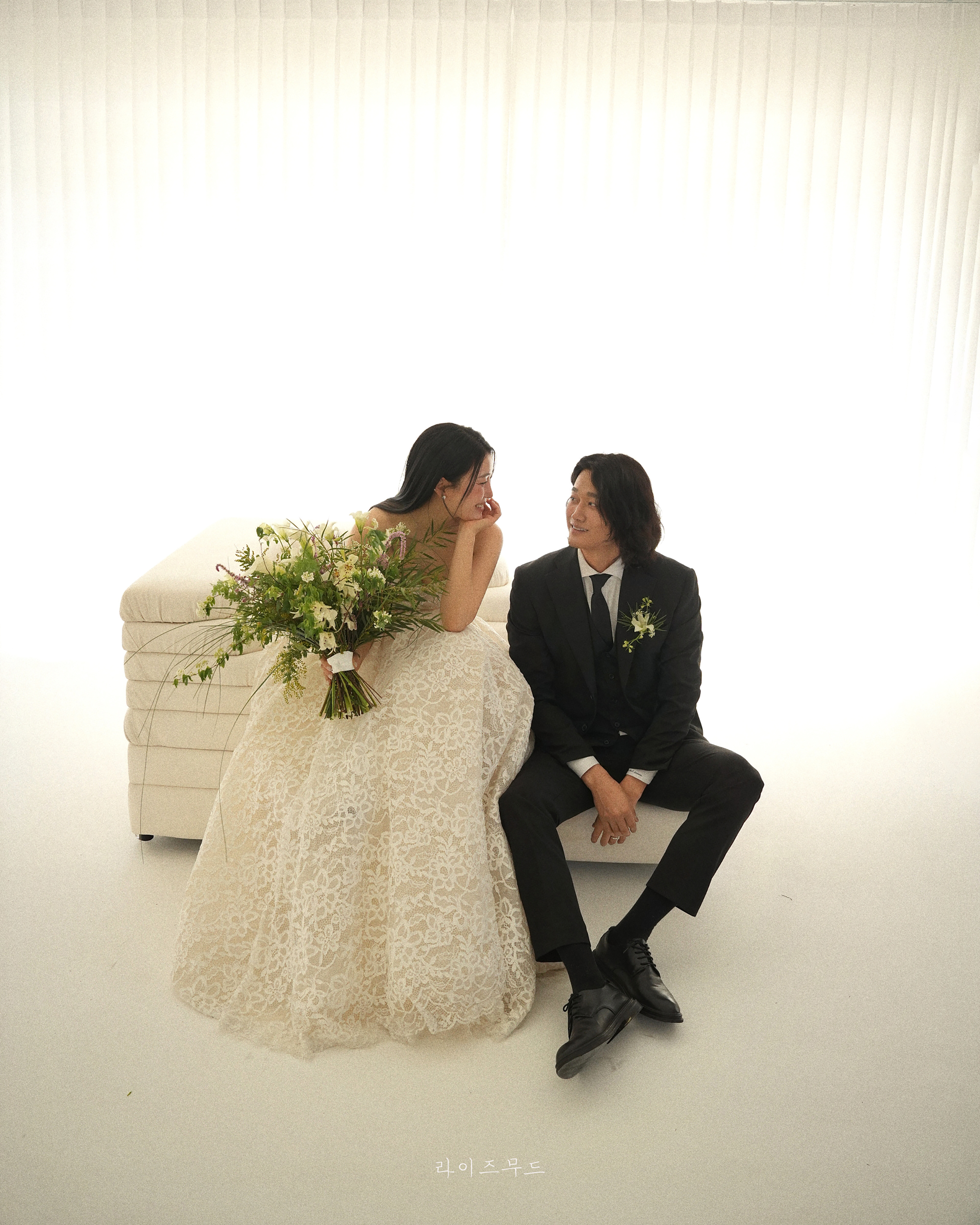 Soft light bridal portrait with bouquet