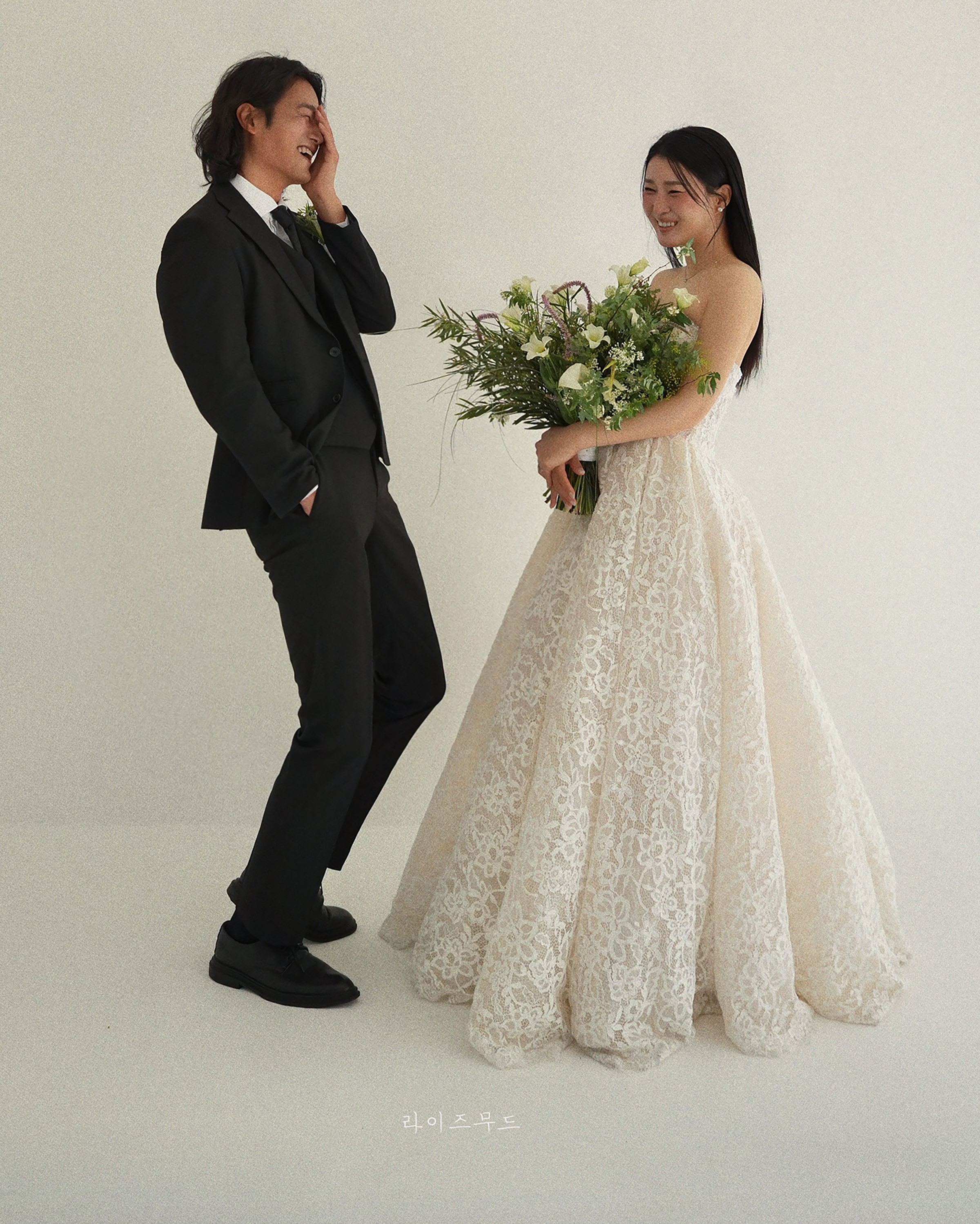 Playful studio wedding portrait